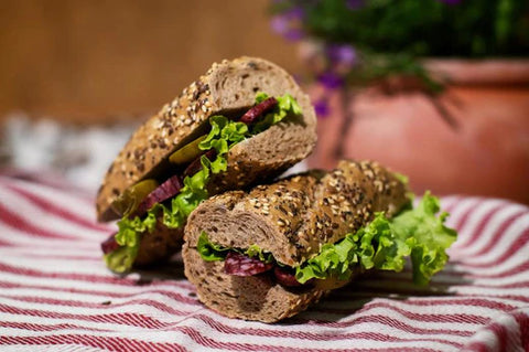 Recipe for a sandwich with whole grain bread and beef sausage